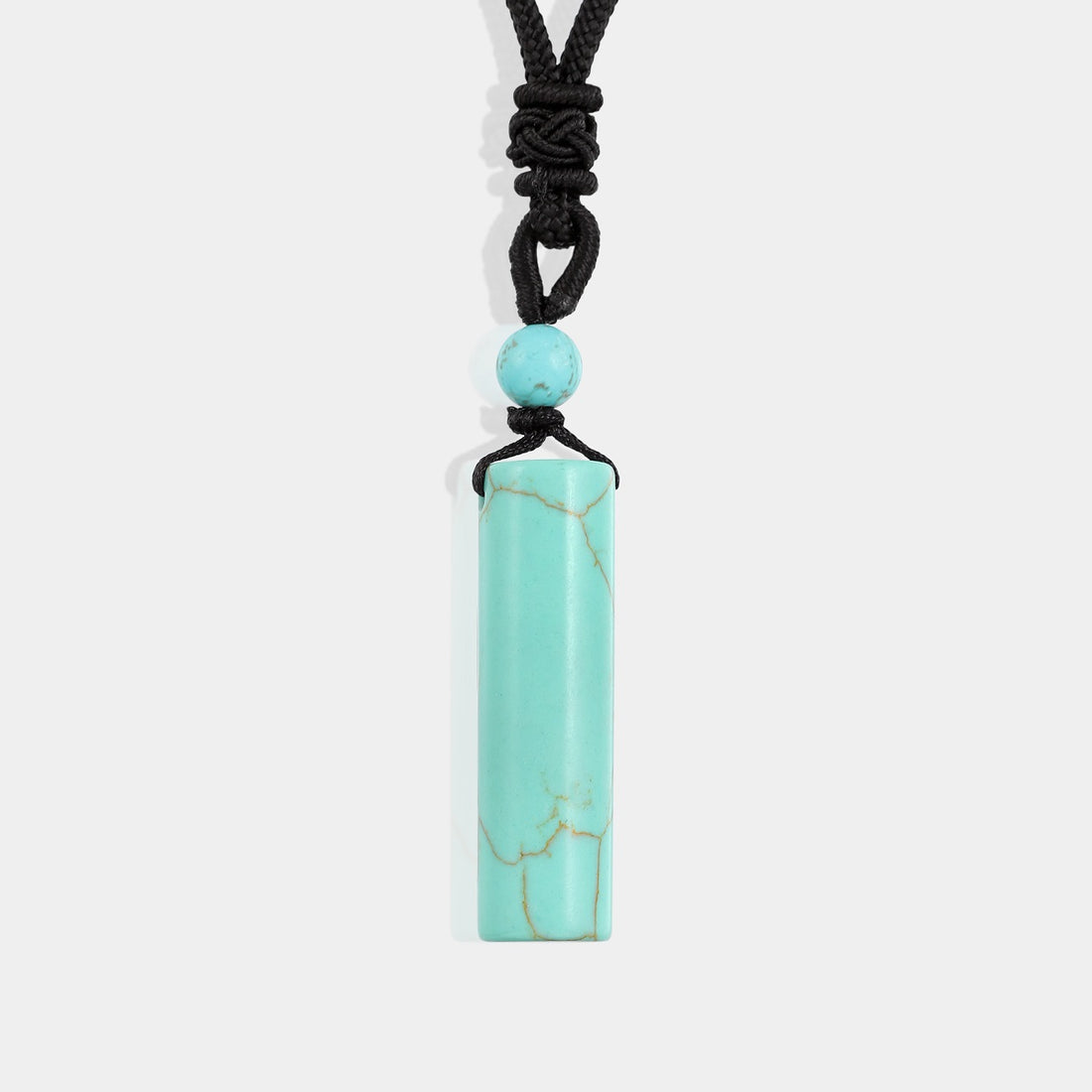Natural Turquoise Cylinder Adjustable Rope Pendant Necklace with vibrant blue-green gemstone and adjustable length