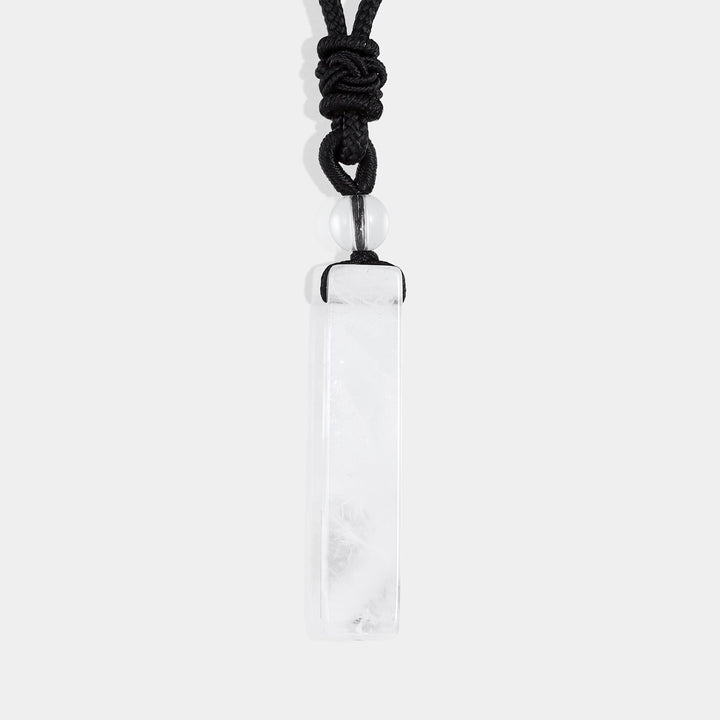 Smooth tube and round-cut White Quartz gemstones in pristine white color.