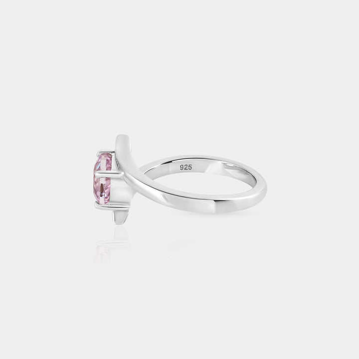 A captivating presentation of the Solitaire Ring, emphasizing the Kunzite's natural beauty and the ring's minimalist design