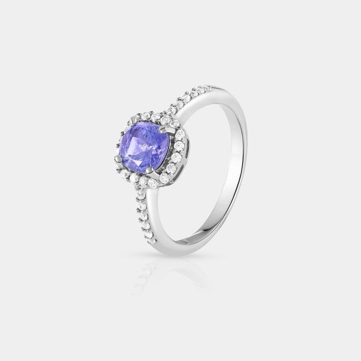 Natural Tanzanite & Zircon Ring showcasing the stunning cushion-cut Tanzanite center stone and surrounding Zircon accents on a Sterling Silver band.