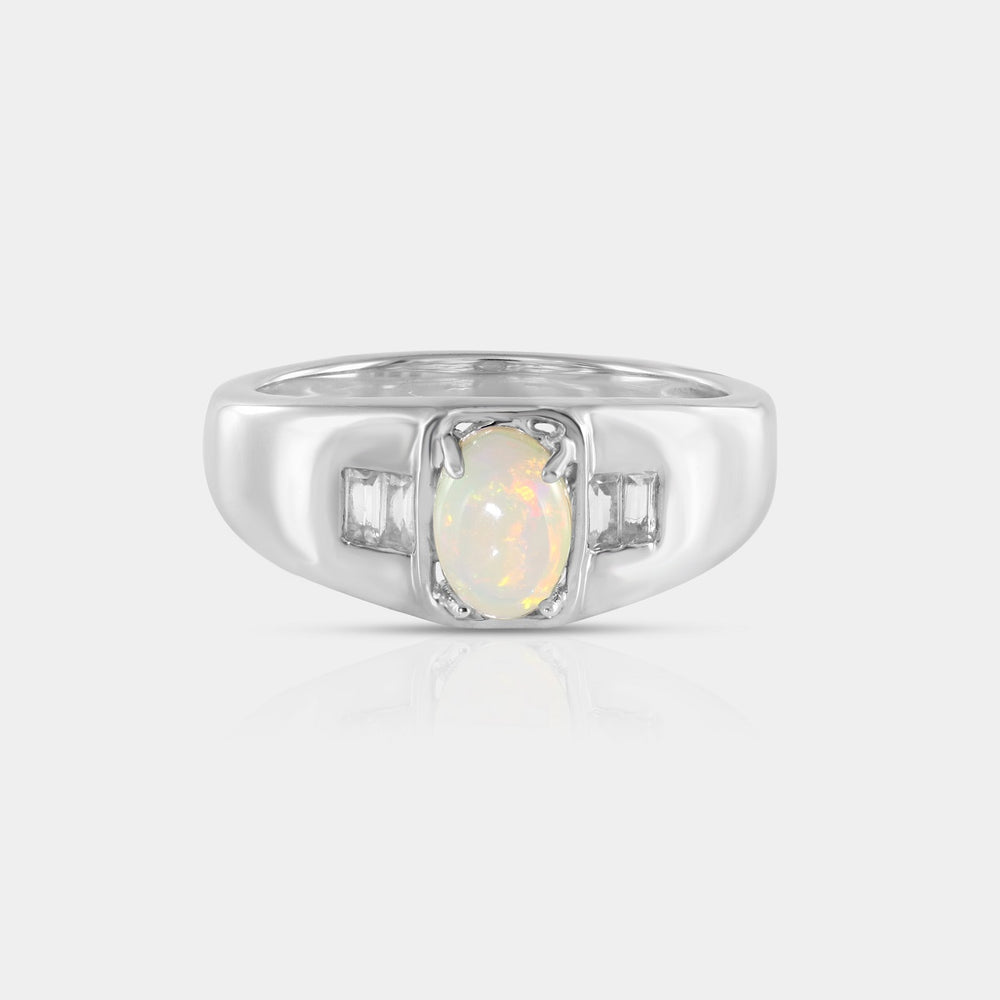 Close-up showcasing the front view of our Natural Ethiopian Opal & Zircon 925 Silver Ring, highlighting the opulence of the 5x7mm oval-shaped Ethiopian Opal in a prong setting