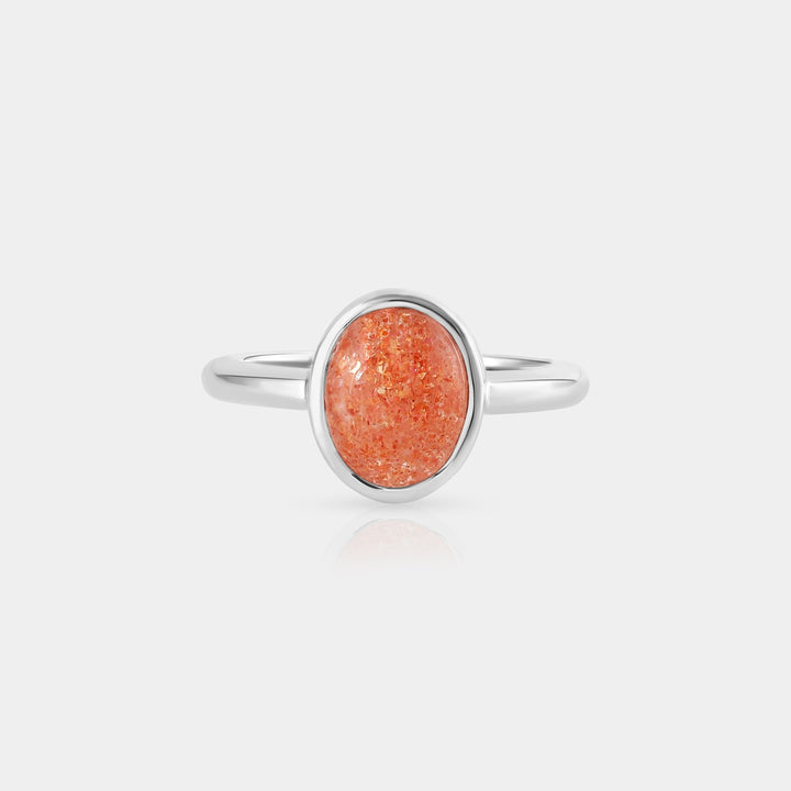  the vibrant orange hues and unique characteristics of the 8 x 10 mm Natural Sunstone Cabochon.