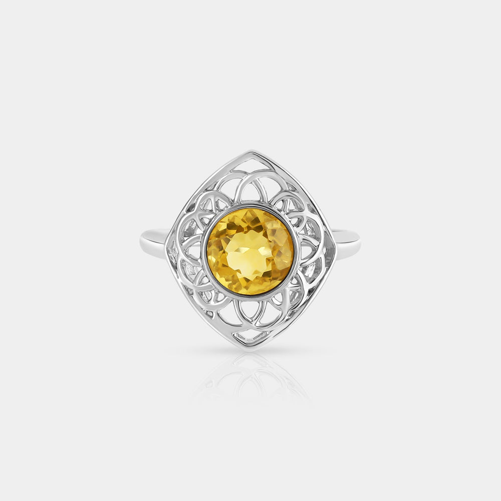 A captivating top-down view showcasing the Natural Yellow Fluorite 925 Silver Solitaire Ring with a vibrant 2.80 Carat round-cut gemstone