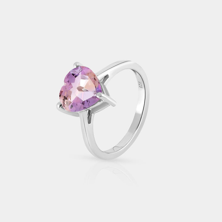 A captivating presentation of the Solitaire Ring, emphasizing the heart-shaped Ametrine and the overall unique design