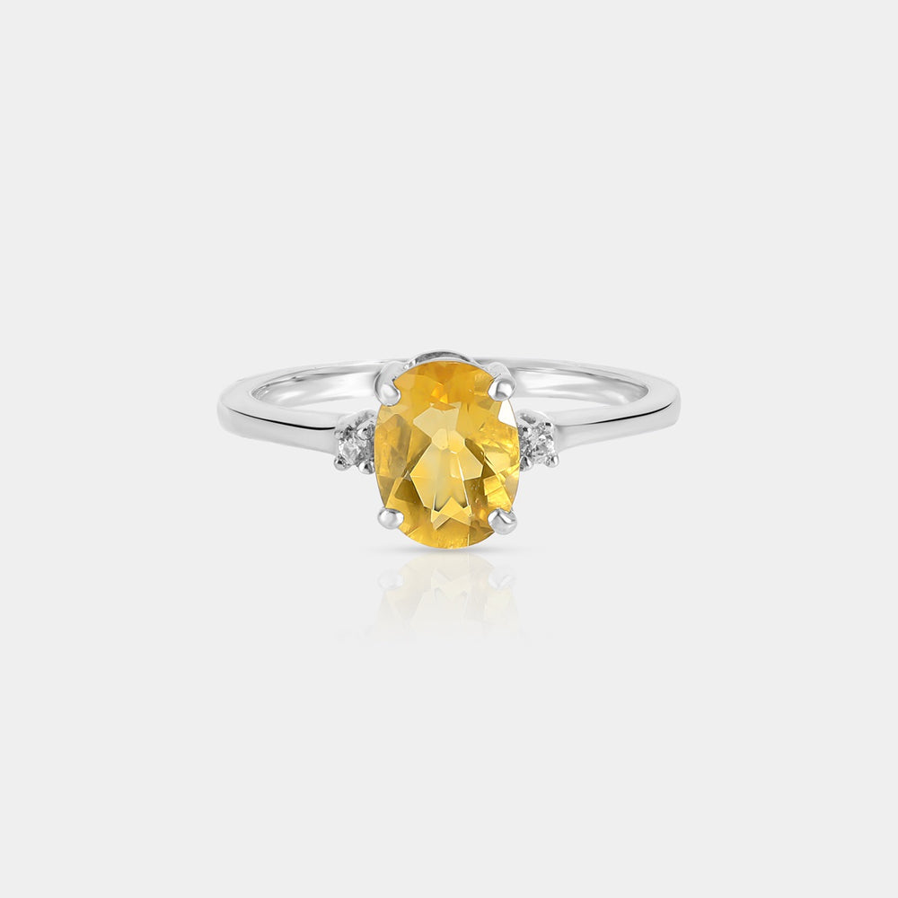 Inspiration shot featuring the Yellow Fluorite & Zircon Ring, elegantly styled for daytime wear, showcasing its versatility and timeless allure