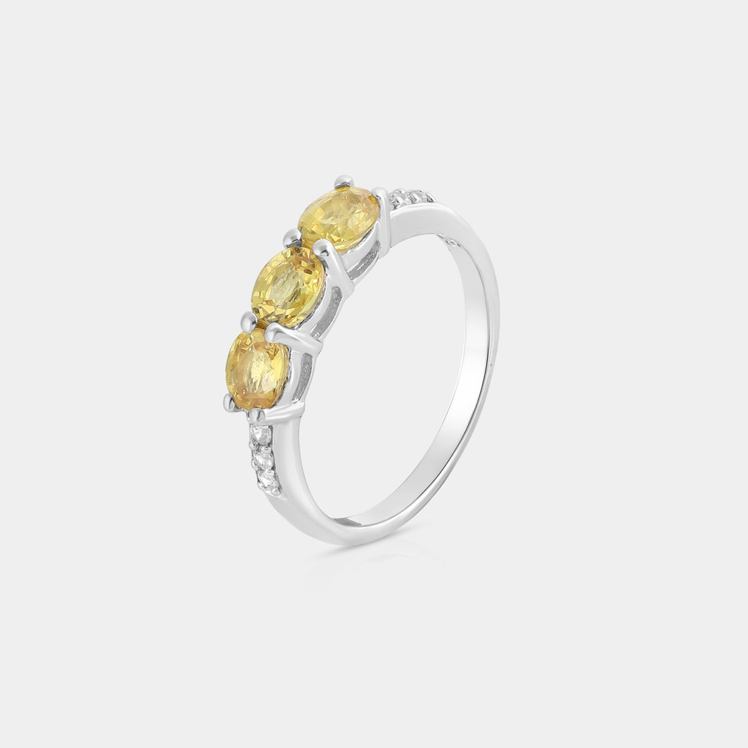 A stunning presentation of the Solitaire with Accents Ring, highlighting the seamless blend of natural gemstones and expert craftsmanship.