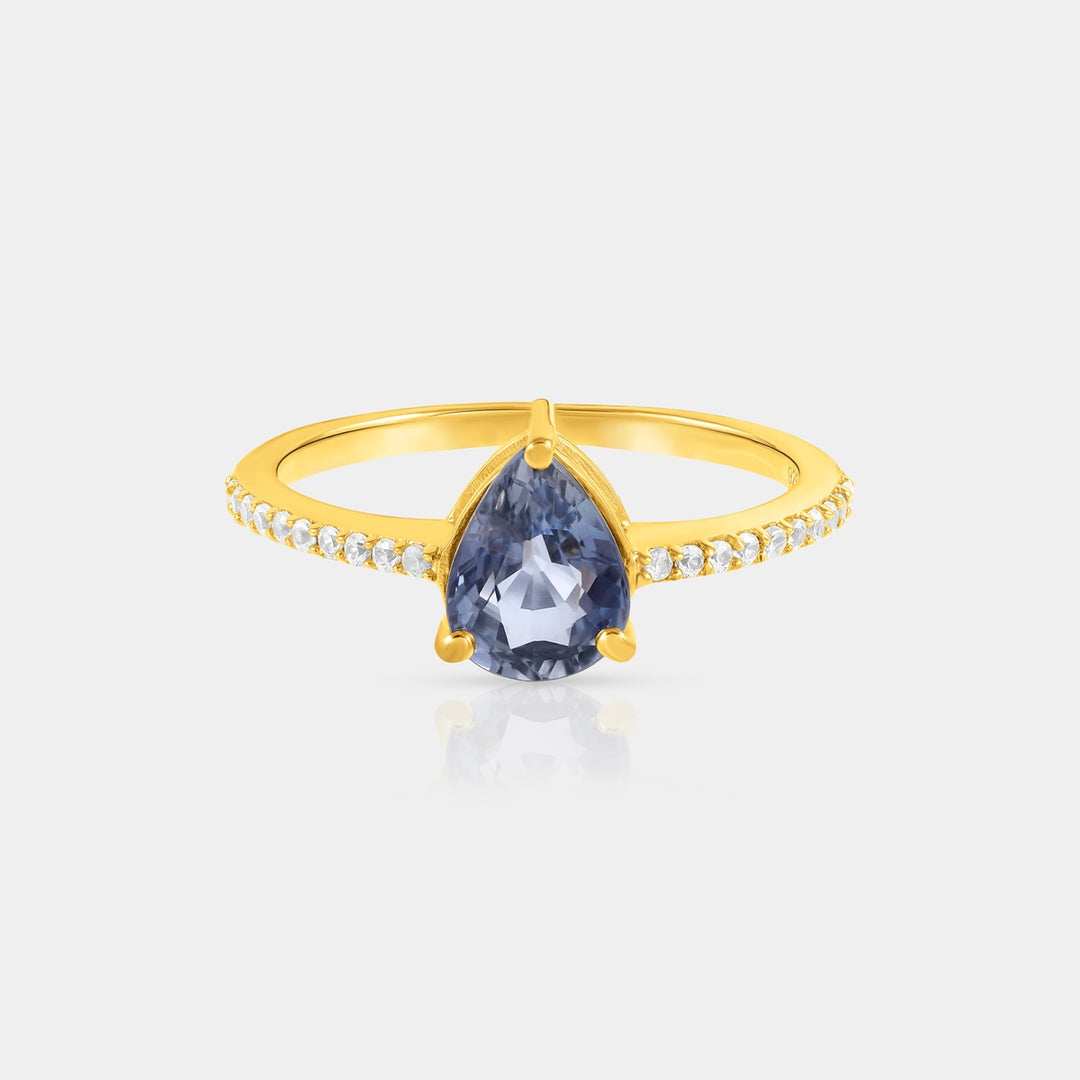 Close-up showcasing the front view of our Natural Ceylon Blue Sapphire and Zircon 925 Sterling Silver Ring, highlighting the 6x8mm pear-shaped Blue Sapphire in a secure prong setting.