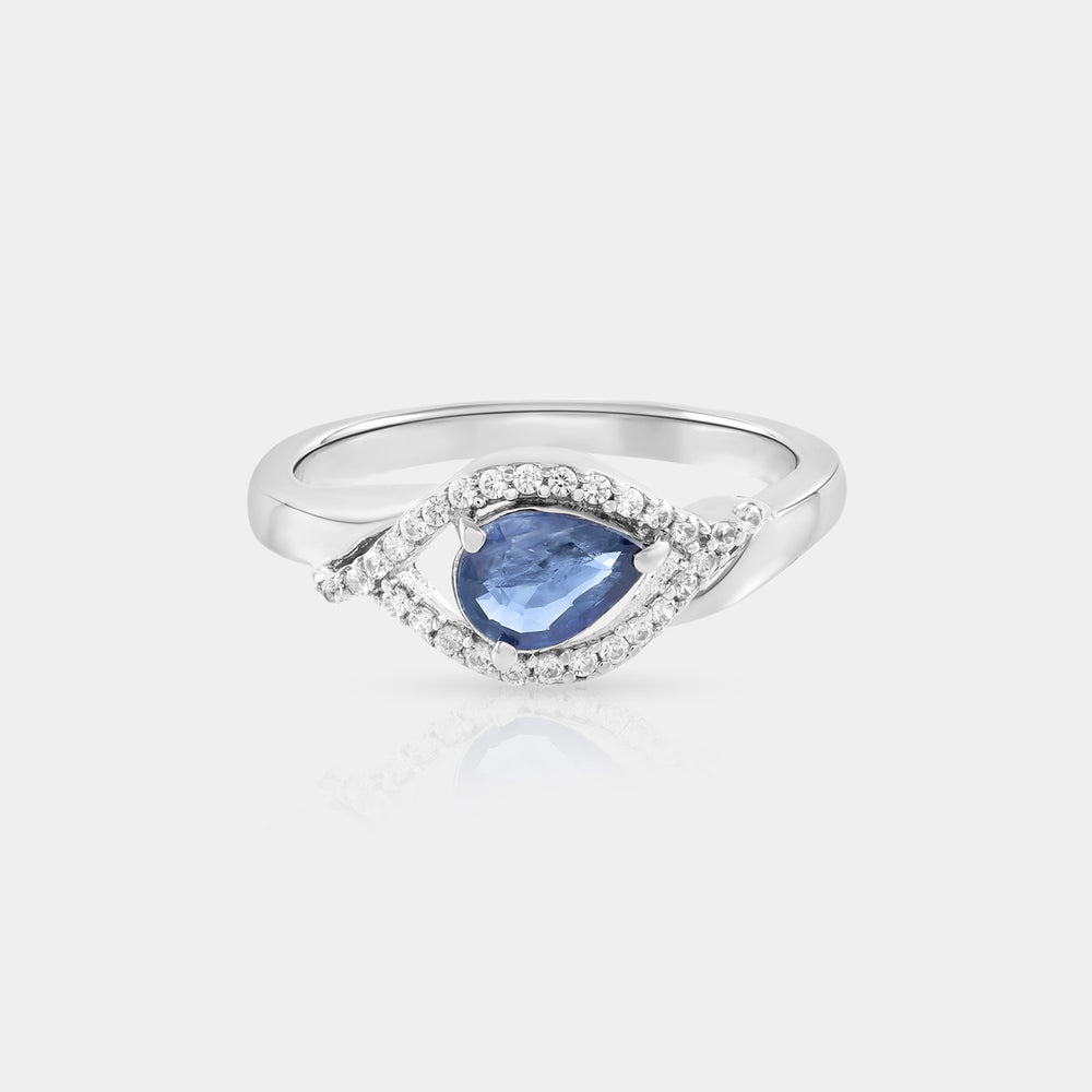 A captivating top-down view showcasing the Blue Sapphire & Zircon 925 Silver Ring with a 0.65 Carat Pear-cut Sapphire and sparkling Zircon accents