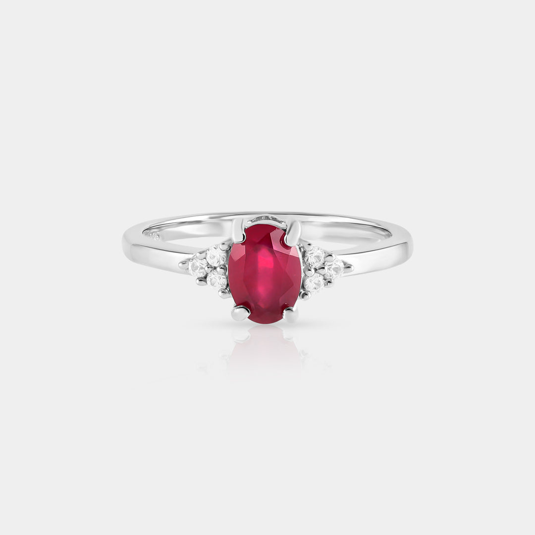 Close-up showcasing the front view of our Natural Ruby & Zircon Silver Ring, highlighting the rich red hue of the 1.25ct oval-shaped Ruby in a secure prong setting.