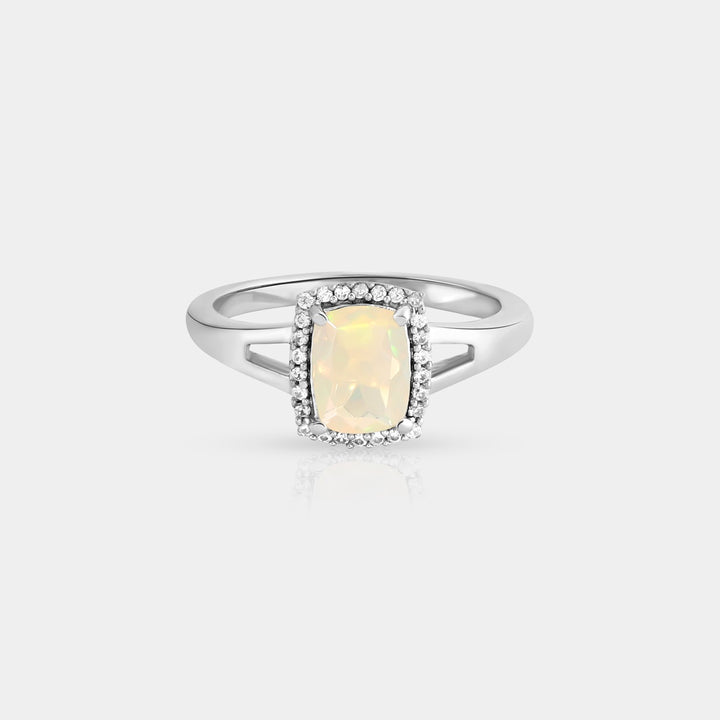 Close-up showcasing the front view of our Ethiopian Opal and Zircon Halo 925 Silver Ring, highlighting the 6x8mm cushion-cut opal in a secure prong setting.