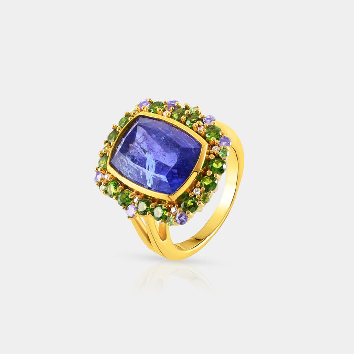 Overhead view showcasing the 10x14 mm Cushion-cut Natural Tanzanite in a secure bezel setting, surrounded by vibrant Tsavorite, Chrome Diopside, and White Zircon.