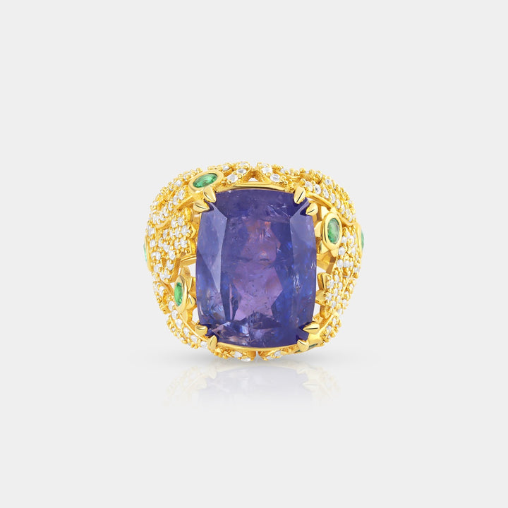 Close-up of the 15.65 Carat Cushion-cut Tanzanite, revealing its captivating blue hue and expert prong setting for maximum visual impact.